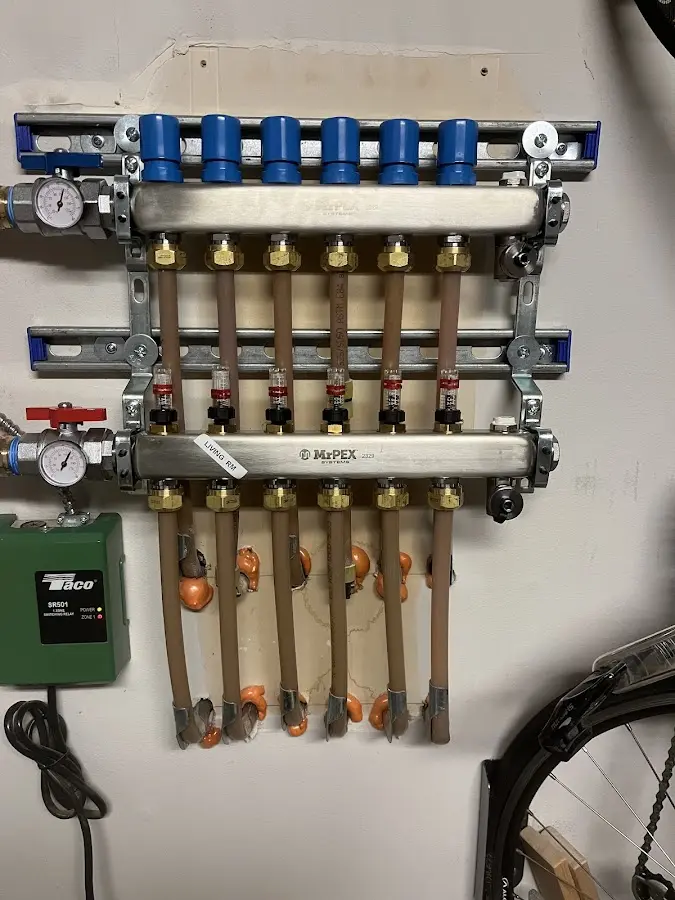 Plumber performing Gas Leak Detection at a residential property in St. Anthony